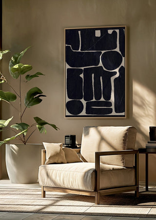 Modern Abstract Minimal Shapes 162 by ThingDesign framed above a beige armchair beside a potted plant