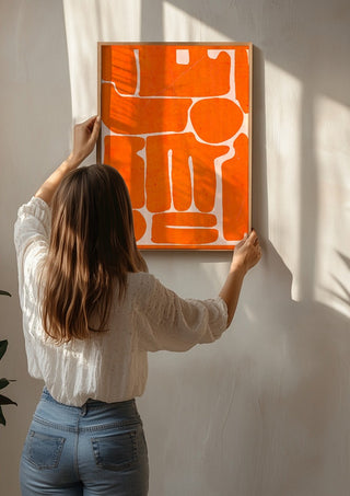 Modern Abstract Minimal Shape 162 by ThingDesign being hung on a sunlit wall