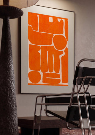 Modern Abstract Minimal Shape 162 by ThingDesign framed in a dim room beside a tubular steel chair