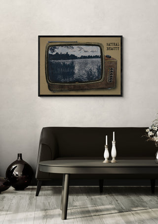 Natural Beauty by Carl Smith ART in a black frame above a dark sofa with candlesticks on a round table