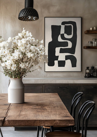 Abstract Art 55 by ThingDesign in a black frame above a rustic table with white flowers