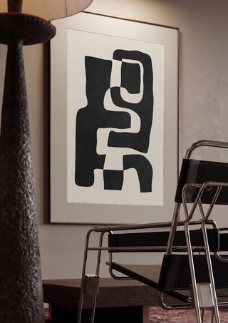 Abstract Art 55 by ThingDesign framed in a dim room beside a tubular steel chair