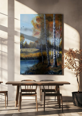 Autumn Birches by the Pond by Lüba hanging above a wooden dining table in warm sunlight