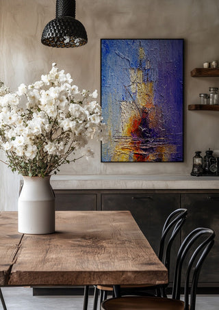 Ships in Violet and Gold by Justyna Kopania in a black frame above a rustic table with white flowers