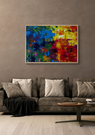 Fragments of Summer by Tako in a light oak frame above a grey sofa on a warm brown wall