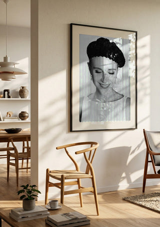The French girl by Bettinafloorphoto in a large black frame in a bright dining room