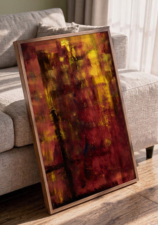 Einmal um die Welt by Sophie Schillen in a walnut frame leaning against a grey sofa