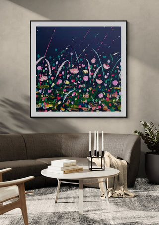Thames Rain by Rebecca Wright in a black frame on a grey wall above a dark sofa with a round table and candlesticks