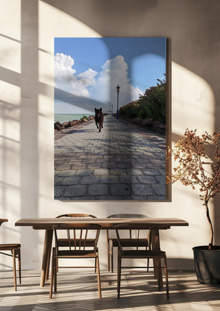 Departure and Return by Bora Kőhalmi hanging above a wooden dining table in warm sunlight