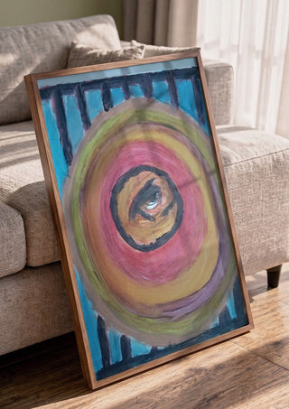 Zeebodem by Mizo in a walnut frame leaning against a grey sofa