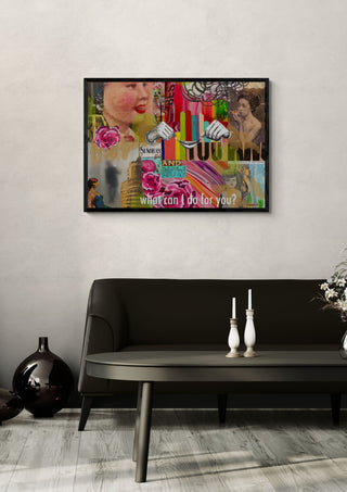 What can I do for you? by María Burgaz in a black frame on a pale wall above a dark sofa with candlesticks