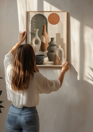Bohemian Ceramic Vases by TimlessArtworks being hung on a sunlit wall