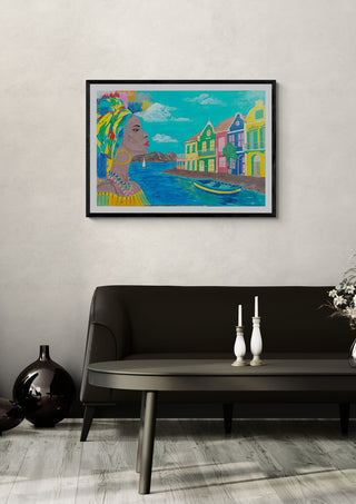 Antillean colors by Sulaika Martis in a black frame on a pale wall above a dark sofa with candlesticks
