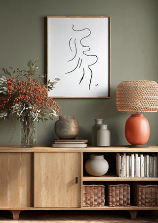 I am move by FridaRit above a wooden sideboard on a sage green wall