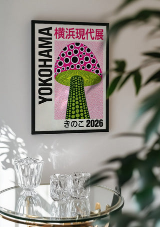 Green Stem Mushroom Poster by Yokohama in a black frame above a glass table with crystal glassware