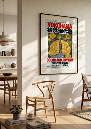 Color and Rhythm Poster by Yokohama in a large black frame in a bright dining room
