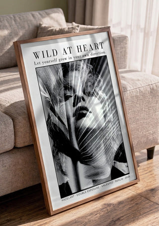 unleafed by hazelart in a walnut frame leaning against a grey sofa