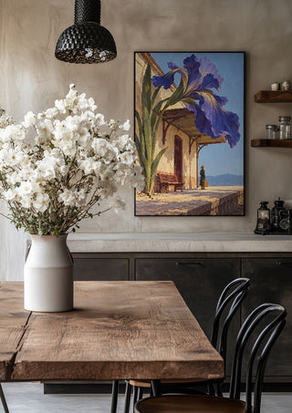 The Station in Bloom by Matthews Gallerie in a black frame above a rustic table with white flowers