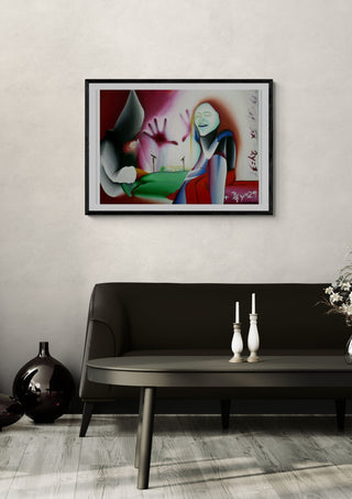 Ténue véu entre o Génio e a Loucura by Luis Valquaresma in a black frame on a pale wall above a dark sofa with candlesticks