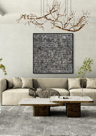 My French Dictionary, Page 38 by Priit Ruttas in a black frame above a pale sofa under a branch chandelier