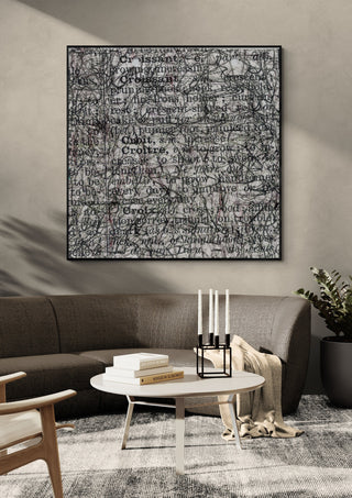 My French Dictionary, Page 38 by Priit Ruttas in a black frame on a grey wall above a dark sofa with candlesticks