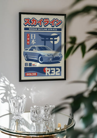 Nissan Skyline GT-R R32 II by Kaminarirace in a black frame above a glass table with crystal glassware