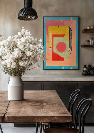 Vermilion Circle by Kareem Rizk in a black frame above a rustic table with white flowers