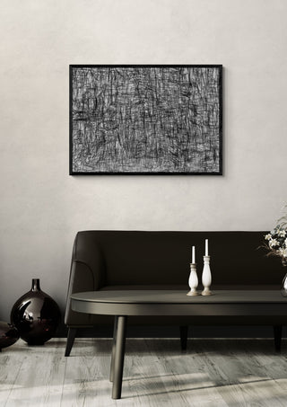 Unusual Landscape by Priit Ruttas in a black frame above a dark sofa with candlesticks
