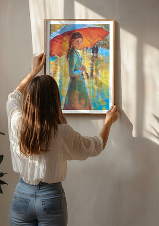 Woman with an Orange Umbrella by Mariia Nikolina being hung on a sunlit wall