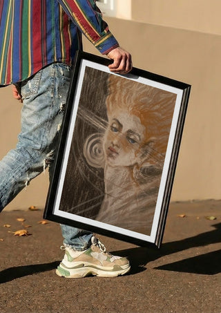 the strings of my soul by Mariia Nikolina carried in a black frame along a sunny street