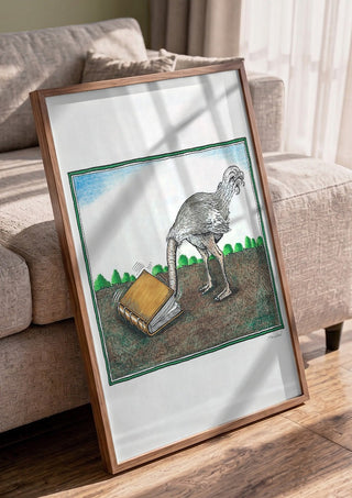 The Ostrich and the Book by Waldemar Mandzel in a walnut frame leaning against a grey sofa