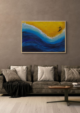 Surfing by GAHO in a pale wooden frame above a grey sofa with cushions