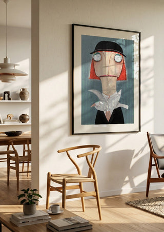 Malwines Strickmöwe by lacaluna in a black frame in a bright dining room with wooden chairs