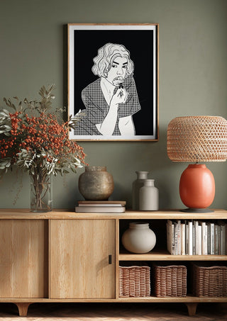 Poppy by Nari above a wooden sideboard on a sage green wall