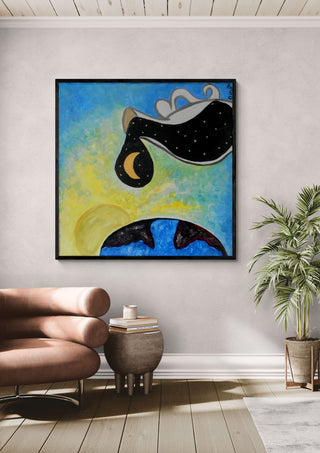 Day into night by A Sleepy Spirit Art in a black frame above a pink armchair beside a palm