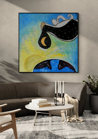 Day into night by A Sleepy Spirit Art in a black frame above a grey sofa with candlesticks