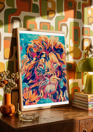 The Geometric King by Bibi in a wooden frame on a sideboard against retro patterned wallpaper