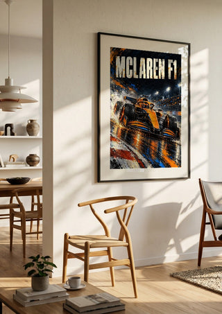 McLaren F1 by Danii Steinfeldt in a black frame in a bright dining room with wooden chairs