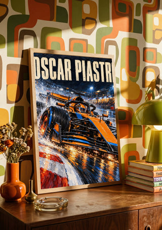 Oscar Piastri by Danii Steinfeldt in a wooden frame on a sideboard against retro patterned wallpaper