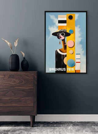 Framed "Bauhaus Woman 01" by David Wolf displayed on a dark wall above a wooden dresser with vases.