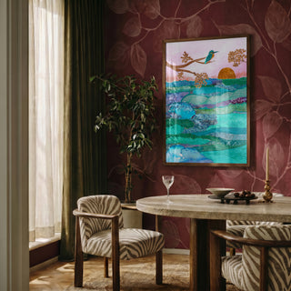 Kingfisher at Sunset by Enikő Marosváry-Kramcsák framed on a deep red patterned wall