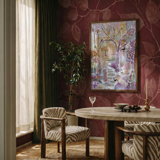 Snowy Sanctuary by Enikő Marosváry-Kramcsák framed on a deep red patterned wall
