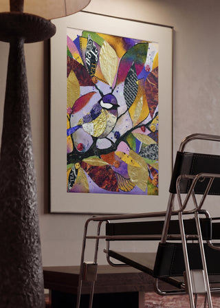 Little Tit in November by Enikő Marosváry-Kramcsák in a mounted frame in a modern interior