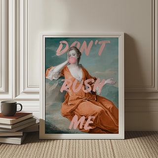 Framed "Sassy Bubble Gum Portrait" art of a woman in orange dress blowing bubble gum with text "DON'T RUSH ME".