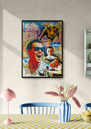 Colorful Wolf of Wall Street - Ricardo Noble poster hanging on a wall above a dining table with flowers.
