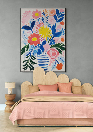Modern Flowers by David Wolf art print featuring colorful abstract flowers in a striped vase, displayed above a bed.