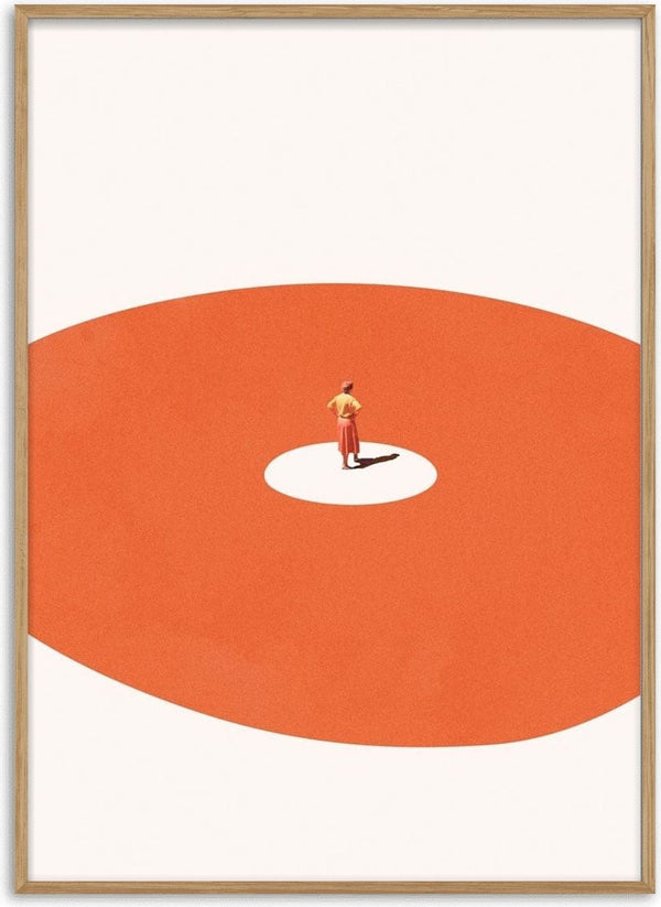 A person in orange stands confidently at the center of a white circle within a large red area.
