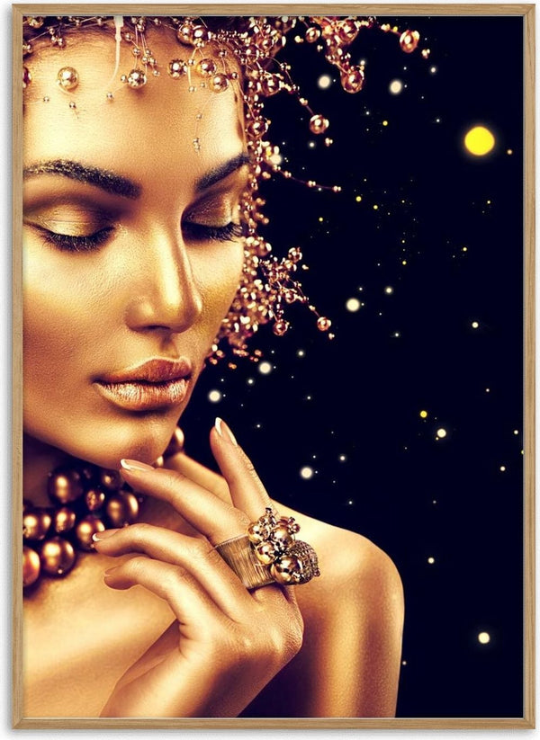 Golden fashion poster featuring a glamorous woman with gold makeup, jewelry, and sparkling decorative elements.
