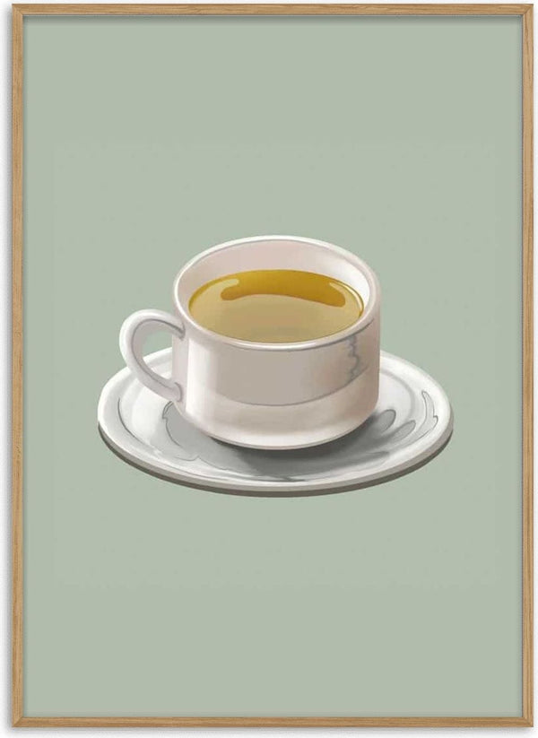 A white cup filled with green tea on a matching saucer, displayed on a muted green background.
