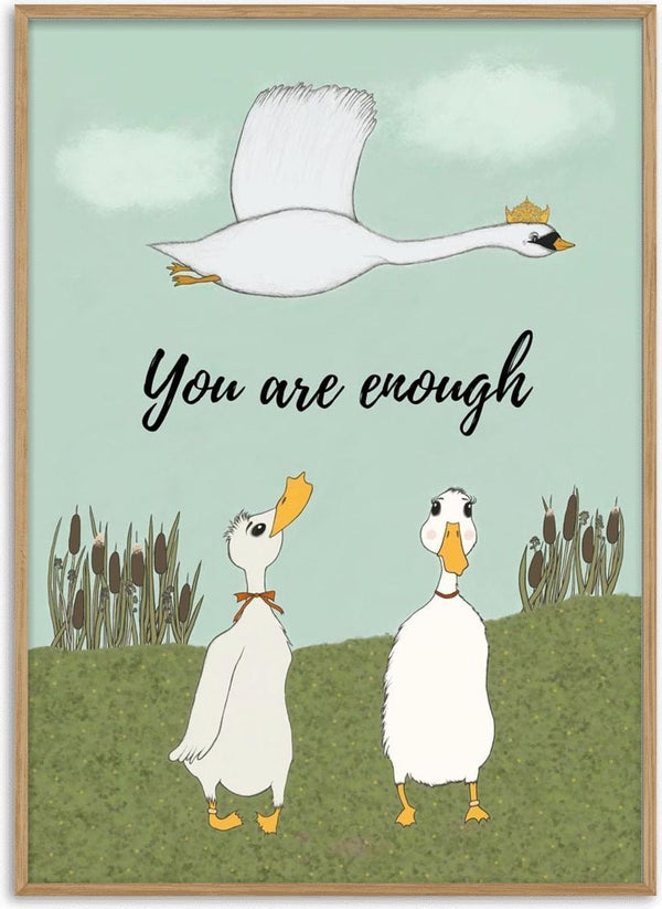 Pastel illustration of a crowned white swan flying above two ducks on a green hill, with the words You are enough.
